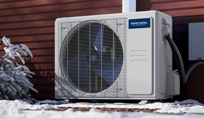 MrCool heat pump unit in snowy winter setting