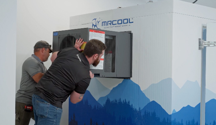 Technicians install new refrigeration